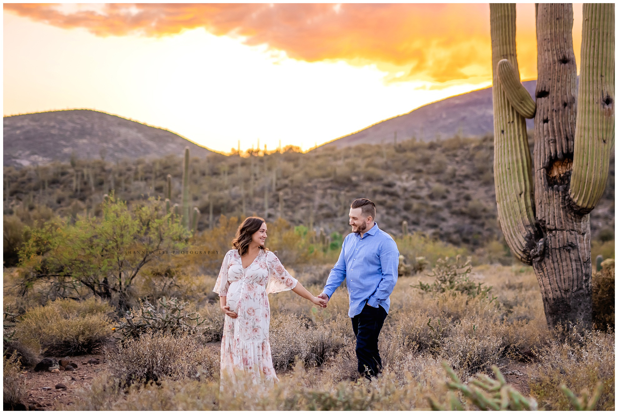 Jessica in floral maternity gown fire sunset in cave creek